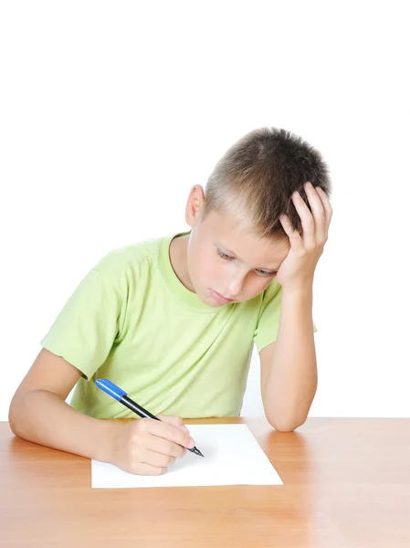 Ödevini yaparken okul çocuğu bıkkın — Stok fotoğraf