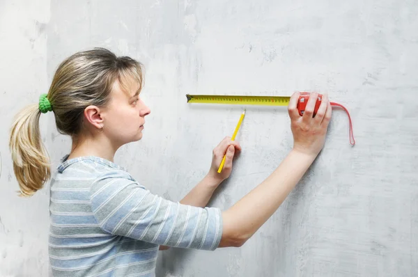 stock image Carpenter worker woman measuring