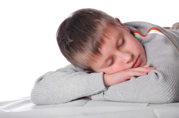 Young boy laying on the floor — Stock Photo, Image