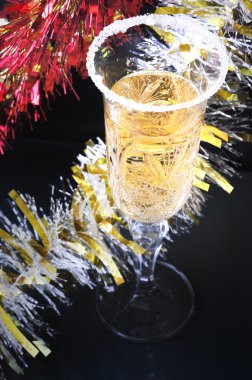 Glass of champagne on black clipart