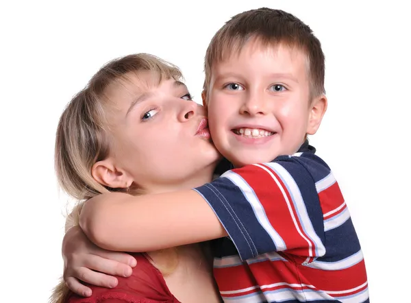 Young son embracing her mother — Stock Photo, Image