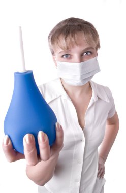 Medical worker holding a blue enema clipart