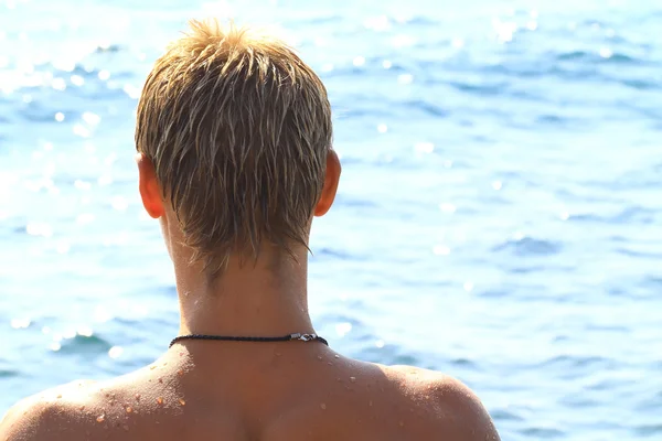 stock image Young man and the sea