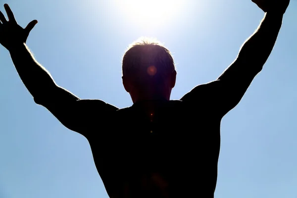 Young man and the sun — Stock Photo, Image