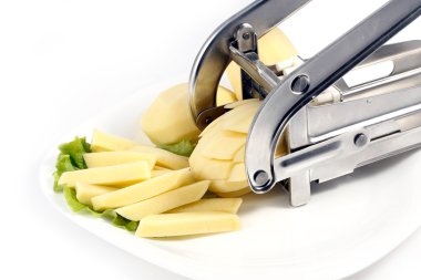 Manual machine for slicing potatoes clipart