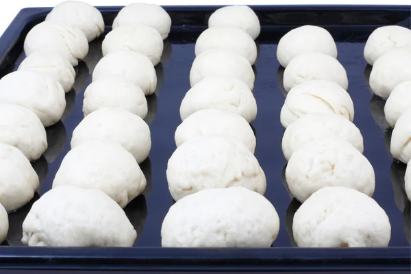 Harvesting of dough for buns — Stock Photo, Image
