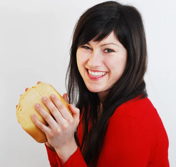 Happy woman with bread — Stock Photo, Image