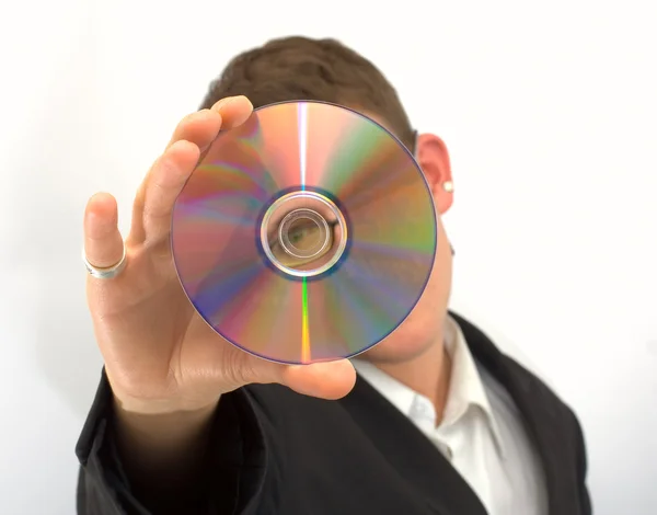 Muž v černé bundě s cd — Stock fotografie