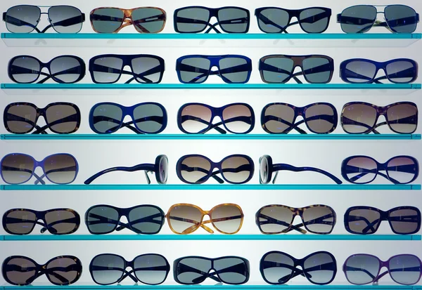 Achtergrond van stijlvolle zonnebrillen Stockfoto