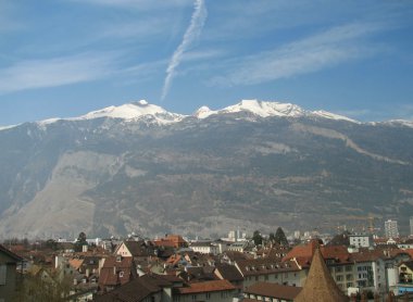 Top of mountain Calanda is covered snow clipart