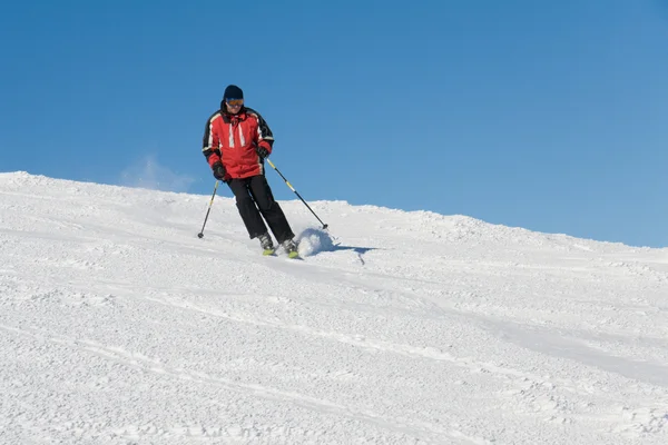 Skier on the slope — Stock Photo, Image