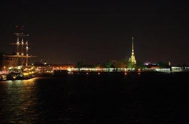 Night view on illuminated ship and stron clipart