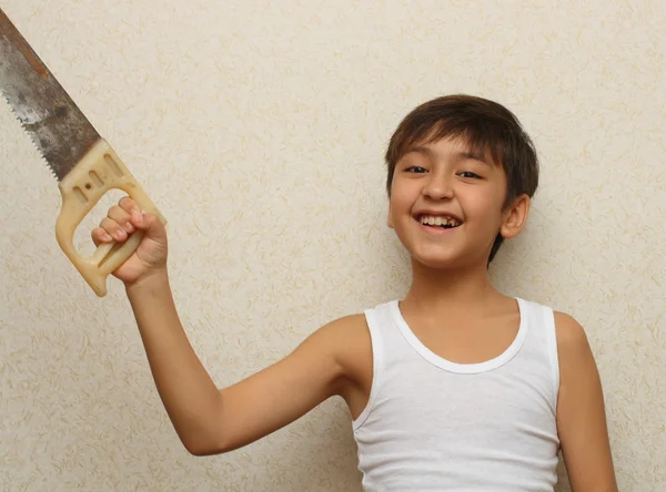 Smiling boy with saw — Stock Photo, Image