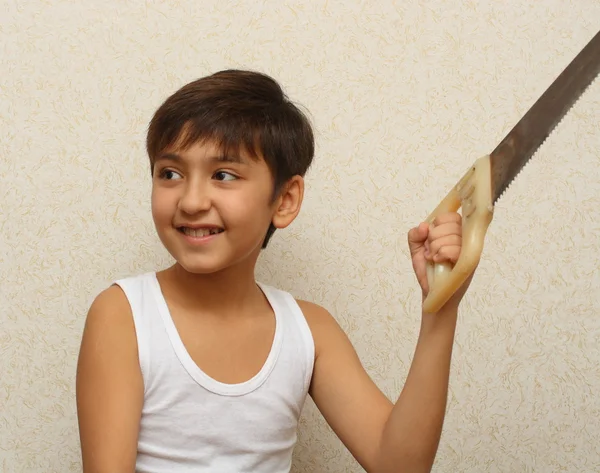Smiling boy with saw — Stock Photo, Image