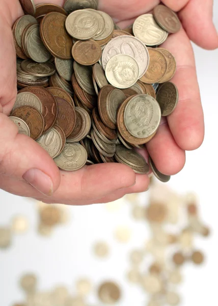 Mince peníze v rukou ženy — Stock fotografie