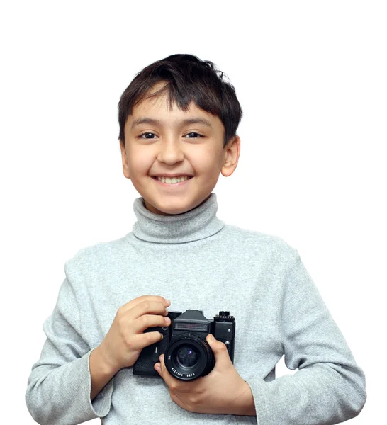 Garçon souriant avec caméra — Photo