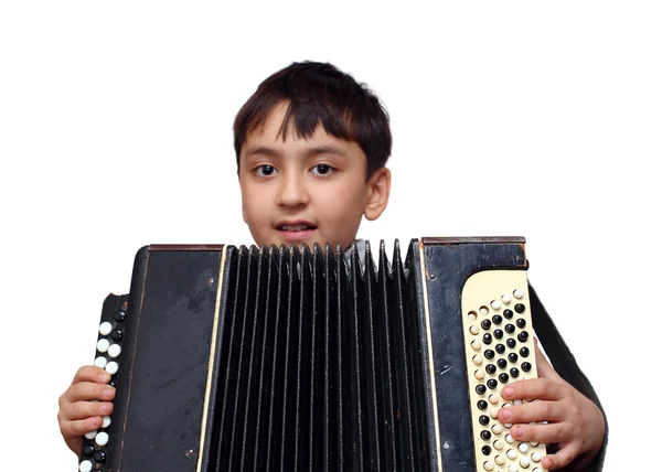 Menino joga em acordeão — Fotografia de Stock