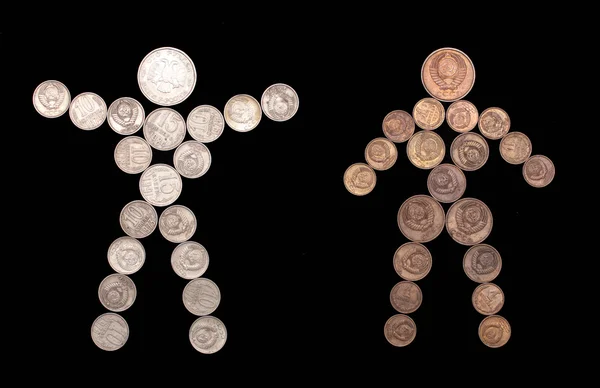 सिक्कों के पुरुष और महिला सिल्हूट — स्टॉक फ़ोटो, इमेज