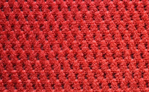 Material de estofamento vermelho close-up — Fotografia de Stock