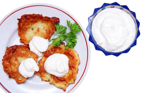 Potato pancakes with sour cream isolated — Stock Photo, Image