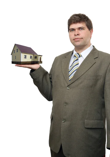 Biznesmen z domu w ręku — Zdjęcie stockowe