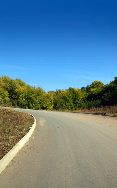 Strada curva in salita — Foto Stock