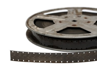 Old movie film on metal reel close-up clipart