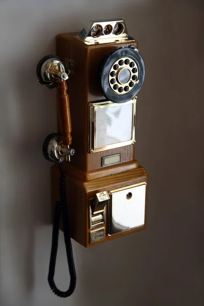Old telephone on wall — Stock Photo, Image