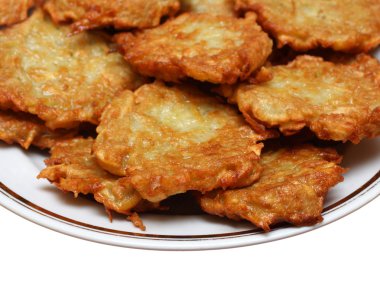 Potato pancakes on plate clipart