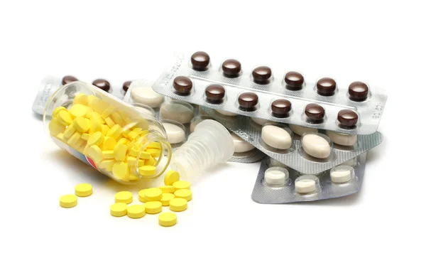 Χάπια σε μπουκάλι και φουσκάλες close-up — Φωτογραφία Αρχείου