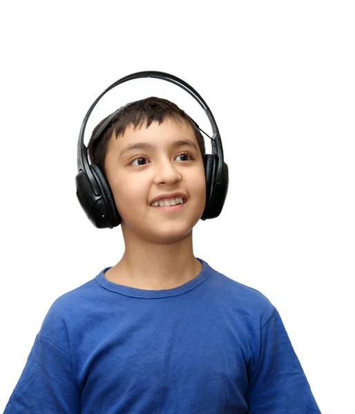 Niño escuchando música en auriculares — Foto de Stock