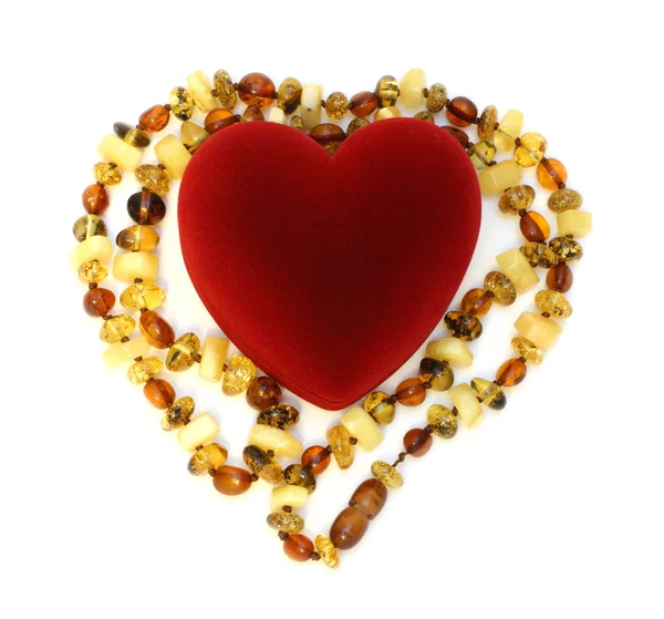 Box heart and amber necklace — Stock Photo, Image