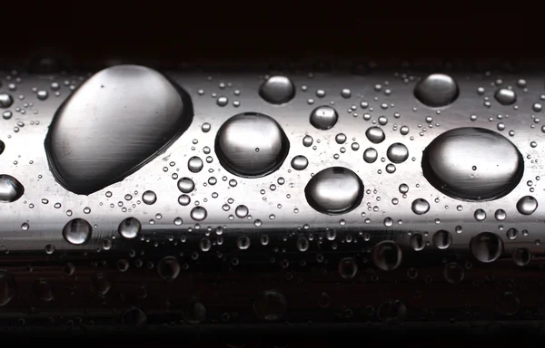 Water drops on metal tube — Stock Photo, Image