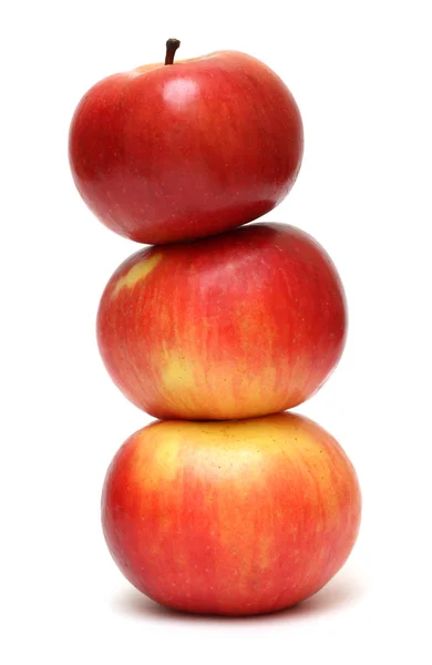 Red apples pyramid on white — Stock Photo, Image
