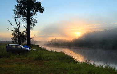 Fog sunrise on the river clipart