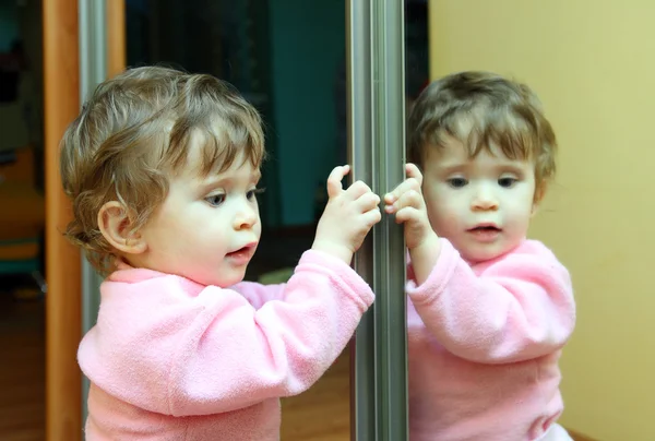 Baby with mirror — Stock Photo, Image