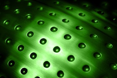 Spherical metal green surface background with ho clipart