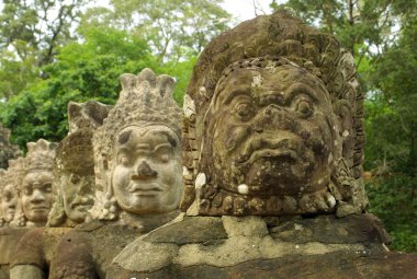 Statues of Angkor temple complex clipart