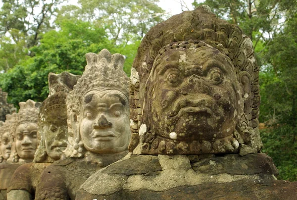 stock image Statues of Angkor temple complex