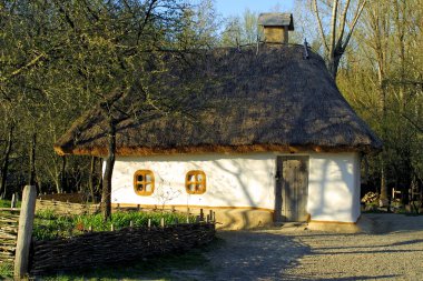 Typical thatched roof house clipart