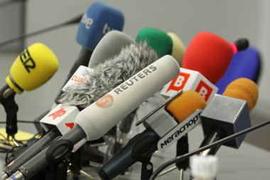 Microphones on a table clipart