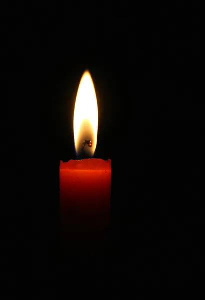 Blazing red candle — Stock Photo, Image