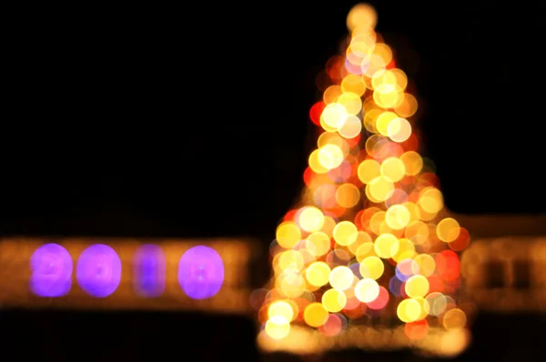 Bokeh lichten van nieuwe jaar boom — Stockfoto