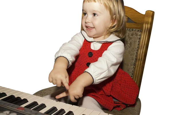女の子遊びのピアノ — ストック写真