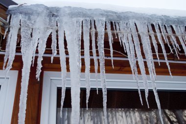 Icicles on roof clipart