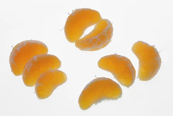 Grupos de segmentos de uma tangerina — Fotografia de Stock