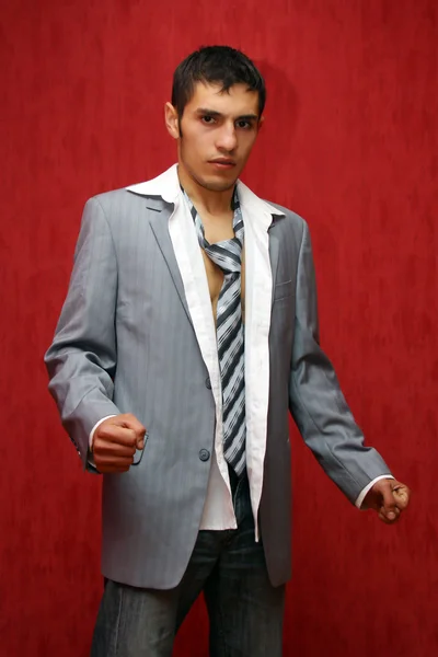 コートを着た若いセクシーな男の子 — ストック写真
