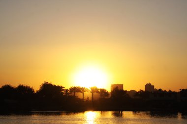 Sunset Cairo from the river Nile bridge clipart