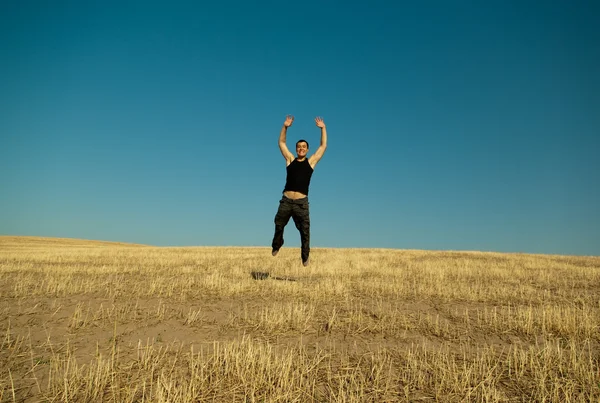 stock image Young handsome asian man jumping