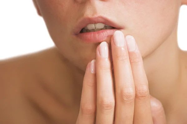 Dedos e lábios femininos — Fotografia de Stock